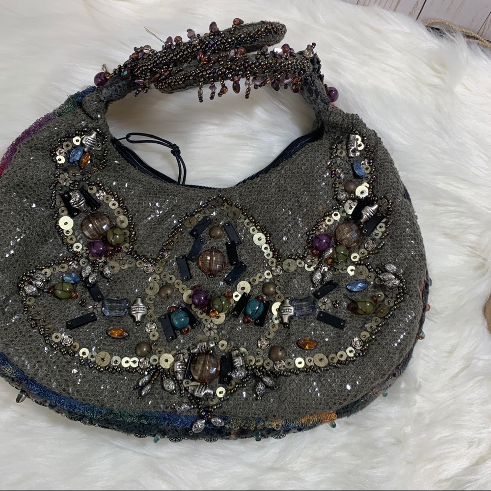 Mary Franfes headed Baguette Wristlet